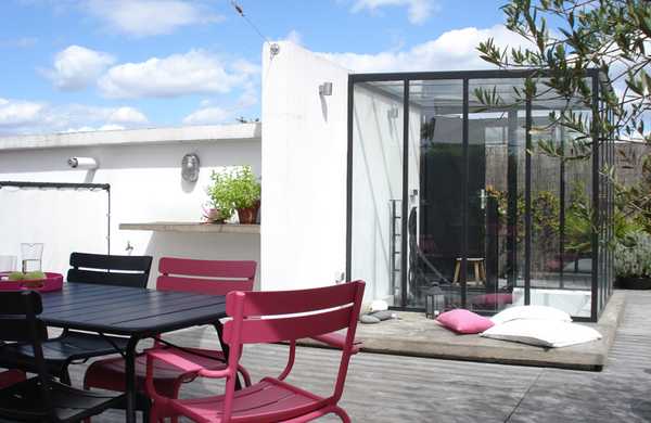 Transformation d'un toit en terrasse végétalisée style Loft par un architece paysagiste à Toulouse