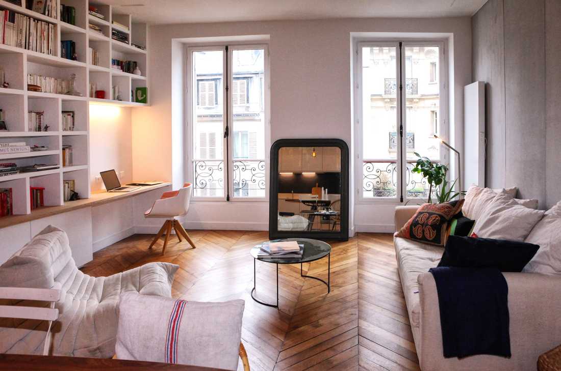 Aménagement d'un espace de vie dans un appartement haussmannien