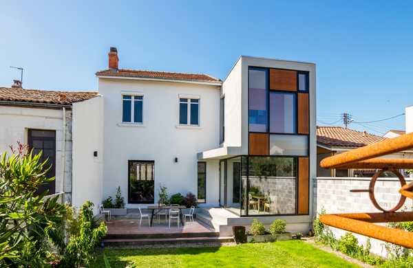 Conception et réalisation d'une extension dans une maison de ville par un architecte à Toulouse