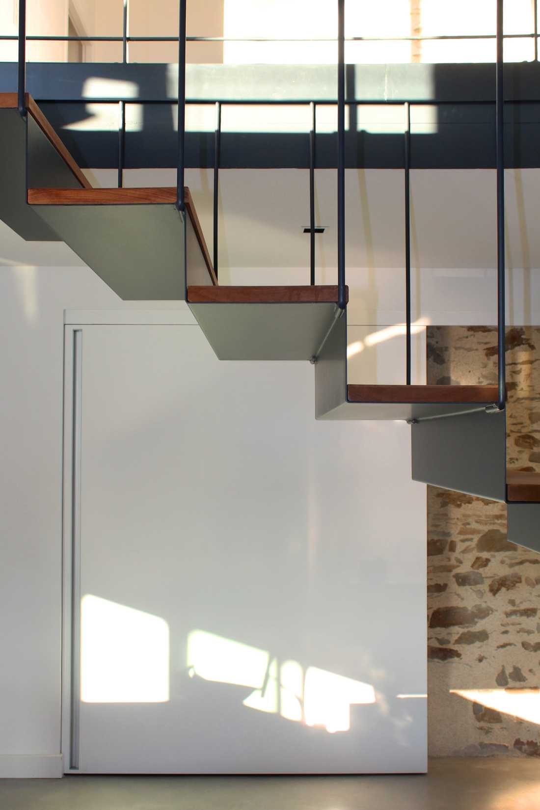 Escalier sur-mesure conçu par un architecte dans un loft