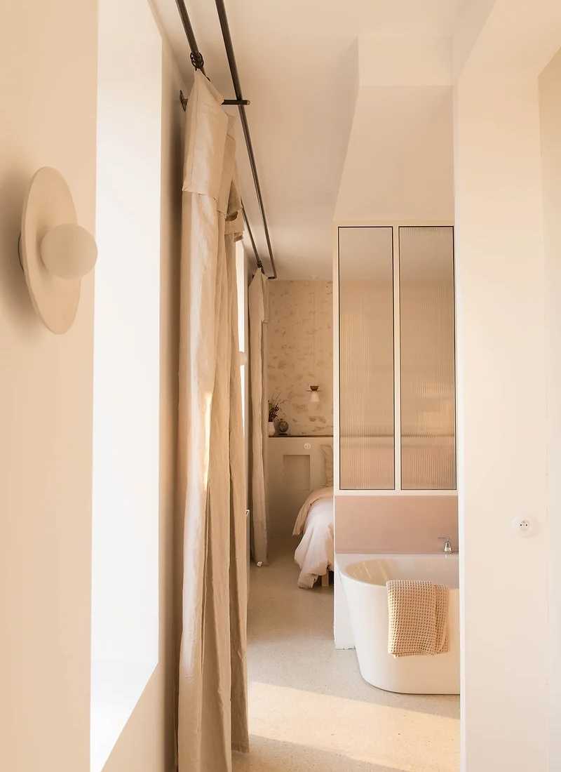 An interior designer renovates the living room of an old apartment in Toulouse